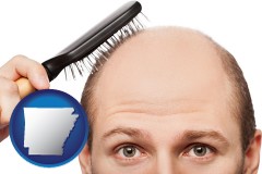 arkansas a balding man brushing his hair