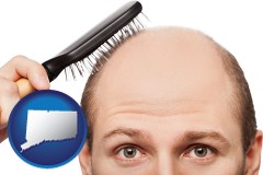 connecticut a balding man brushing his hair