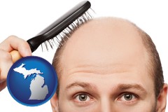 michigan map icon and a balding man brushing his hair