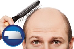 nebraska map icon and a balding man brushing his hair
