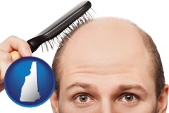 new-hampshire a balding man brushing his hair